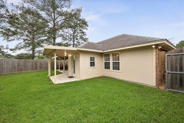 7385 Hidden Valley Dr, Beaumont, TX 77706 - back of property featuring a patio, a shingled roof, stucco siding, and ceiling fan