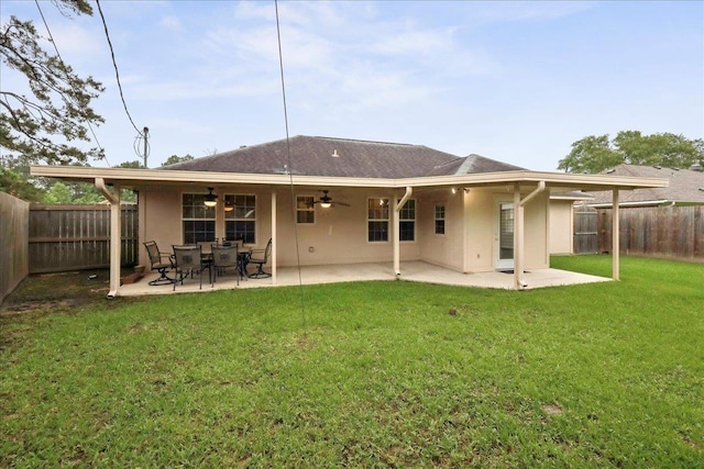 7385 Hidden Valley Dr, Beaumont, TX 77706 - rear view of house featuring ceiling fan, stucco siding, and a patio
