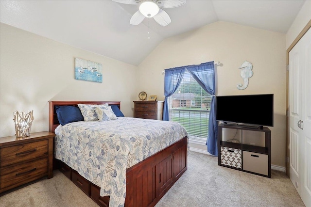 7385 Hidden Valley Dr, Beaumont, TX 77706 - bedroom featuring light carpet, vaulted ceiling, and a ceiling fan