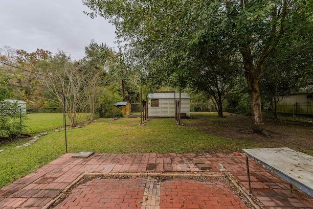 view of patio / terrace featuring a storage unit