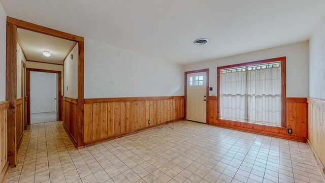 foyer with light tile patterned floors