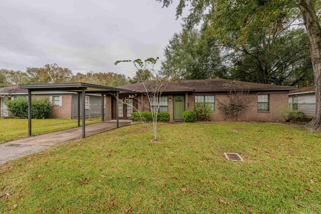 ranch-style home with a front yard