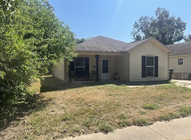 view of front of home with a front yard