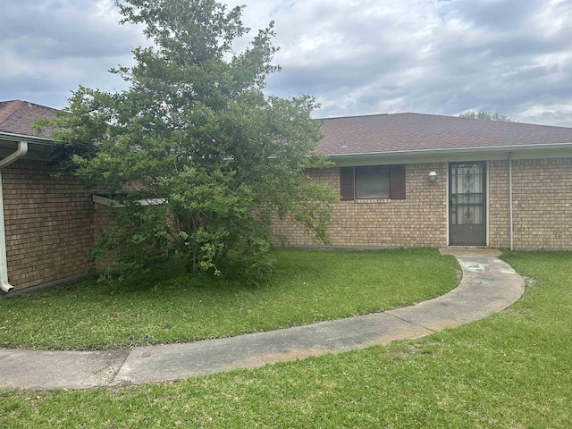 exterior space with a front lawn