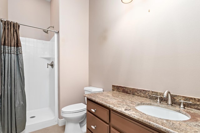 bathroom with toilet, tile patterned floors, walk in shower, and vanity