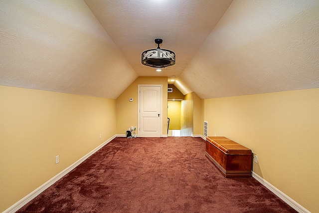 3812 Debbie Ave, Groves, TX 77619 - bonus room featuring carpet flooring, lofted ceiling, and baseboards