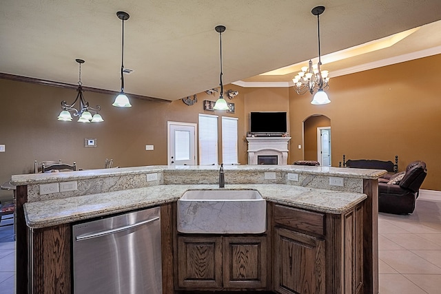 3812 Debbie Ave, Groves, TX 77619 - kitchen featuring stainless steel dishwasher, open floor plan, a sink, light tile patterned floors, and crown molding