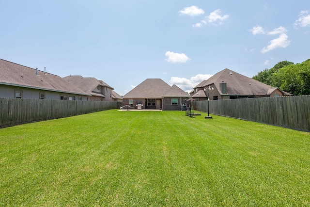 3812 Debbie Ave, Groves, TX 77619 - view of yard featuring a patio area