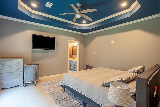 3812 Debbie Ave, Groves, TX 77619 - bedroom featuring a tray ceiling, ornamental molding, recessed lighting, connected bathroom, and baseboards