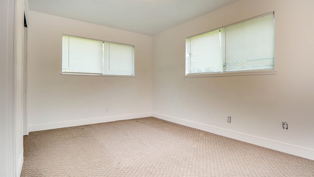 3875 Bowen Dr, Beaumont, TX 77708 - carpeted empty room featuring baseboards