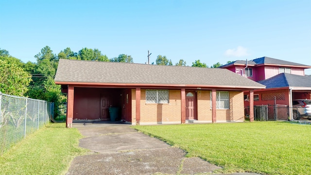 3875 Bowen Dr, Beaumont, TX 77708 - ranch-style home featuring concrete driveway, brick siding, a carport, and a shingled roof