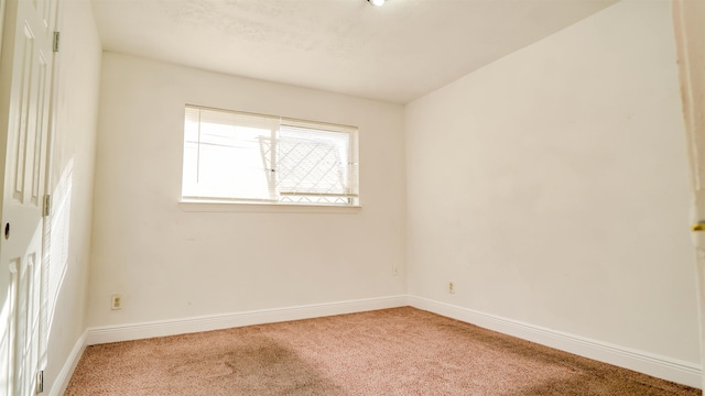 3875 Bowen Dr, Beaumont, TX 77708 - carpeted spare room featuring baseboards