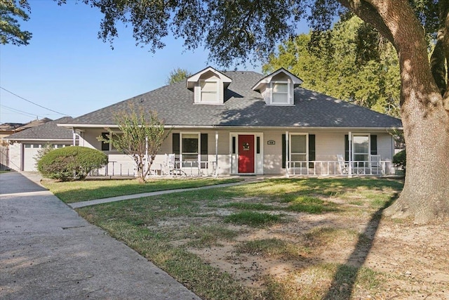 view of front of property with a front yard and a porch