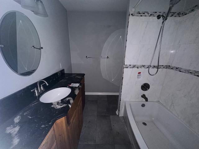 320 Meadow Dr, Bridge City, TX 77611 - bathroom featuring vanity, tile patterned floors, and bathtub / shower combination