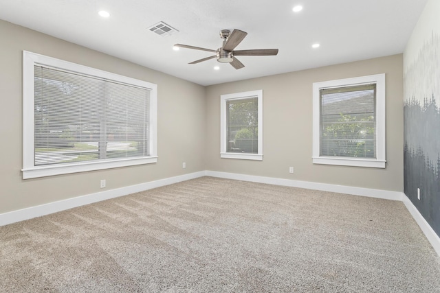 spare room with baseboards, ceiling fan, carpet flooring, and recessed lighting