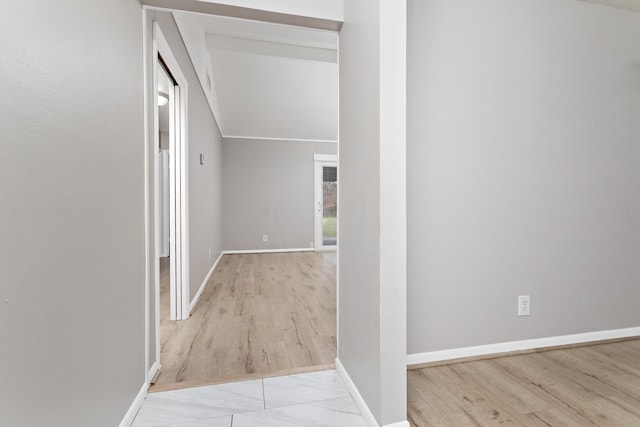 hall with light hardwood / wood-style flooring