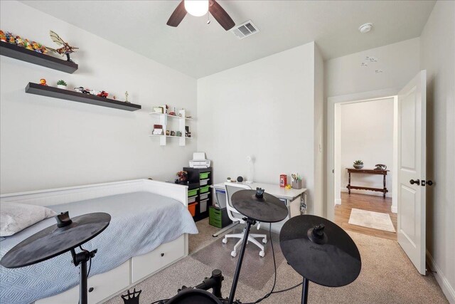 9270 Pampas St, Beaumont, TX 77713 - bedroom featuring visible vents, a ceiling fan, and light carpet