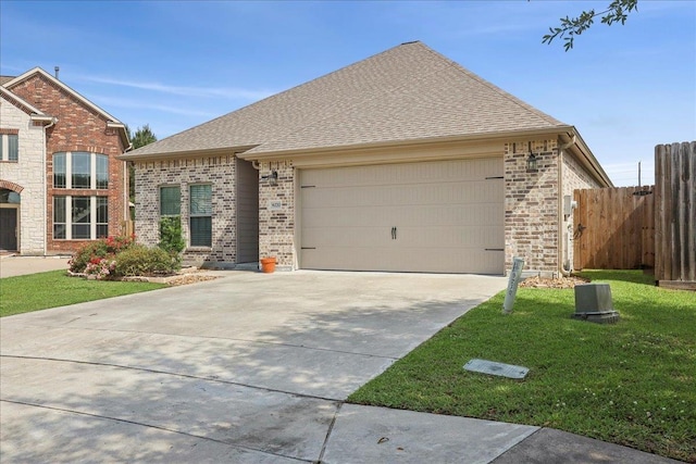 9270 Pampas St, Beaumont, TX 77713 - ranch-style home with fence, concrete driveway, brick siding, and a garage