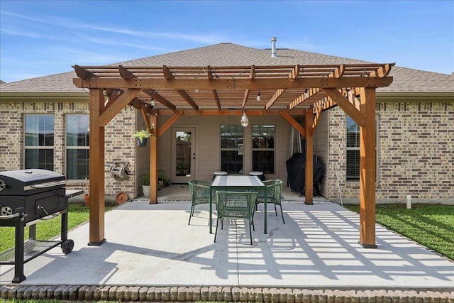 9270 Pampas St, Beaumont, TX 77713 - view of patio featuring outdoor dining space, area for grilling, and a pergola