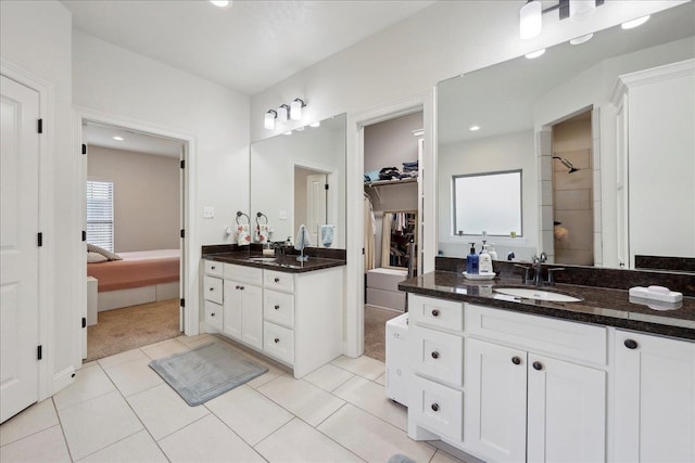 9270 Pampas St, Beaumont, TX 77713 - full bath featuring recessed lighting, two vanities, tile patterned flooring, and a sink