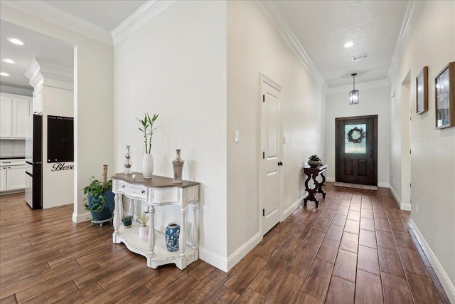 9270 Pampas St, Beaumont, TX 77713 - foyer entrance with ornamental molding, dark wood-style floors, and recessed lighting