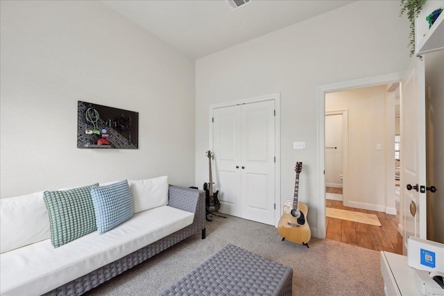 9270 Pampas St, Beaumont, TX 77713 - living area with visible vents, carpet, and baseboards