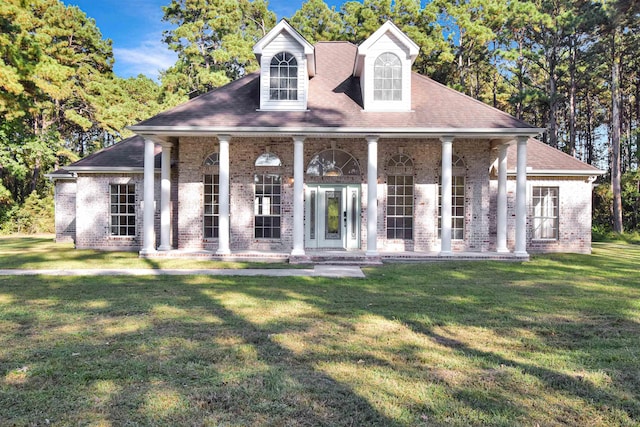 view of front of house featuring a porch and a front yard