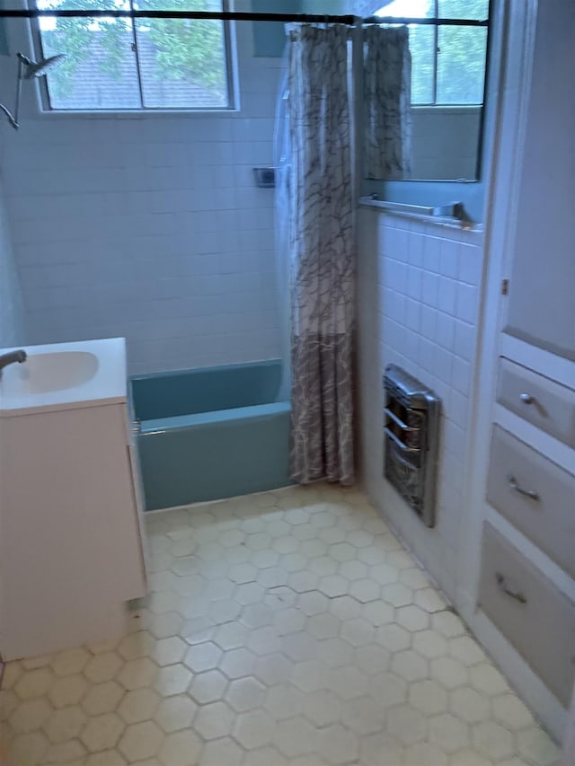 2515 Glenwood Dr, Port Arthur, TX 77642 - full bathroom with shower / bathtub combination with curtain, healthy amount of natural light, vanity, and tile patterned floors