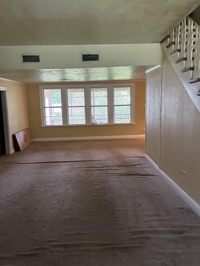 2515 Glenwood Dr, Port Arthur, TX 77642 - unfurnished room featuring carpet floors, healthy amount of natural light, and stairway