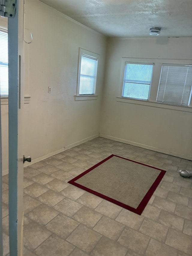 2515 Glenwood Dr, Port Arthur, TX 77642 - unfurnished room featuring baseboards