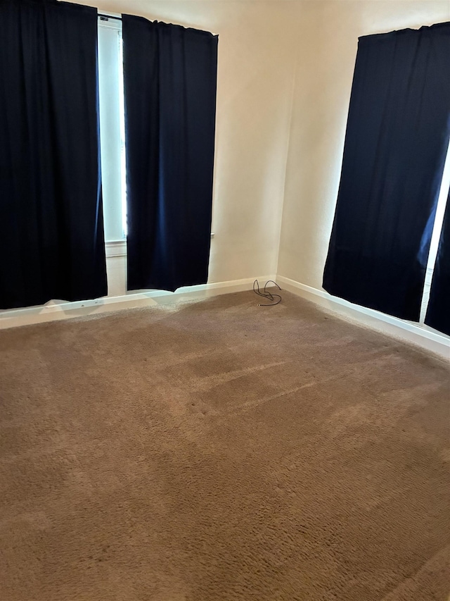 2515 Glenwood Dr, Port Arthur, TX 77642 - empty room with carpet flooring and baseboards