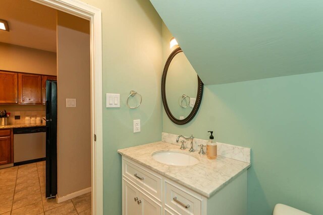 1620 Wellington Pl, Beaumont, TX 77706 - bathroom with vanity, tile patterned floors, and toilet