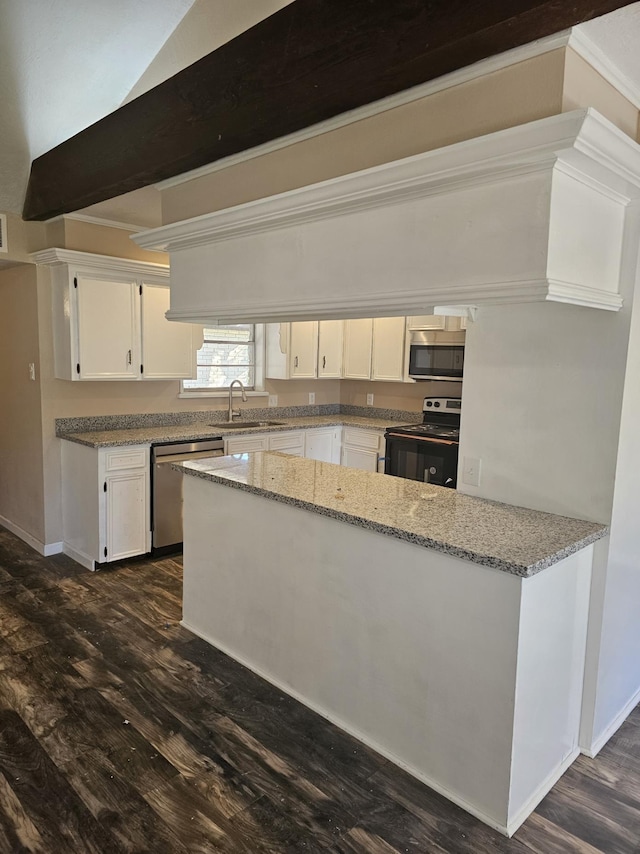 kitchen with dark wood-type flooring, white cabinets, sink, light stone countertops, and stainless steel appliances