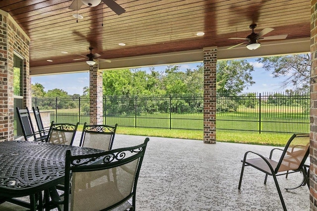 view of patio / terrace featuring ceiling fan