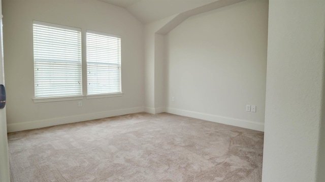 2650 Cedar Spgs, Port Arthur, TX 77640 - carpeted spare room featuring baseboards and vaulted ceiling
