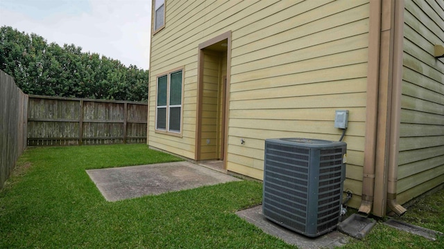 2650 Cedar Spgs, Port Arthur, TX 77640 - exterior view of cooling unit and a fenced backyard