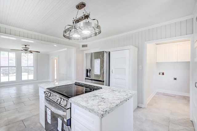 kitchen featuring white cabinetry, ceiling fan, hanging light fixtures, and appliances with stainless steel finishes