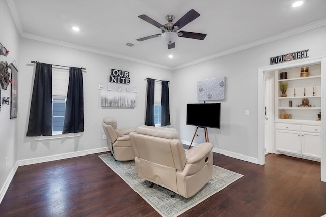 living room with dark wood-type flooring, ceiling fan, and ornamental molding