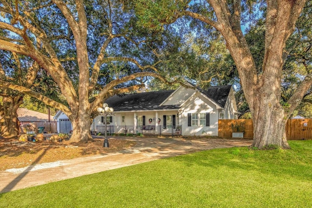 ranch-style home with a front lawn