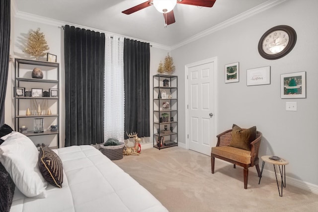 carpeted bedroom featuring ceiling fan and ornamental molding