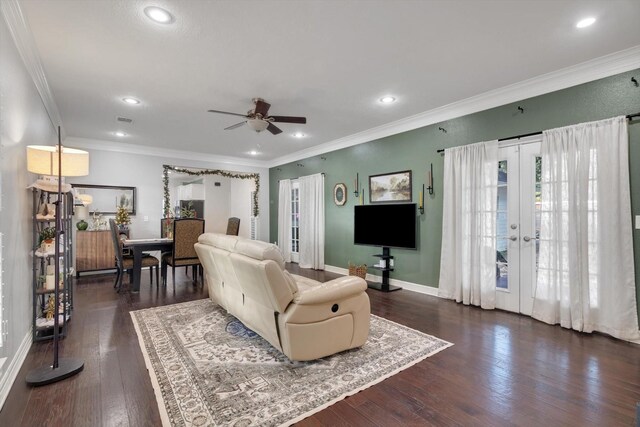 living room featuring french doors, dark hardwood / wood-style flooring, ceiling fan, and crown molding