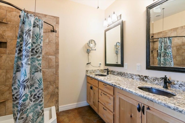 bathroom with vanity, tile patterned floors, and shower / tub combo with curtain