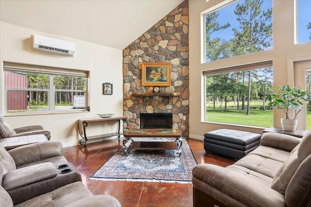 living room with a wall mounted AC, a stone fireplace, and high vaulted ceiling