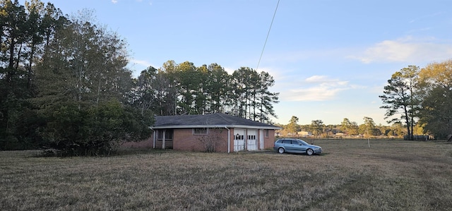 exterior space featuring a lawn