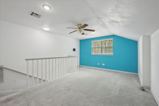 6635 Griffing Rd, Beaumont, TX 77708 - bonus room with a textured ceiling, carpet floors, ceiling fan, and visible vents