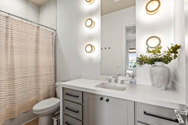 950 Sue Dr, Crystal Beach, TX 77650 - bathroom with toilet, curtained shower, and vanity