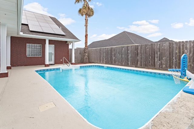 view of pool featuring a patio area