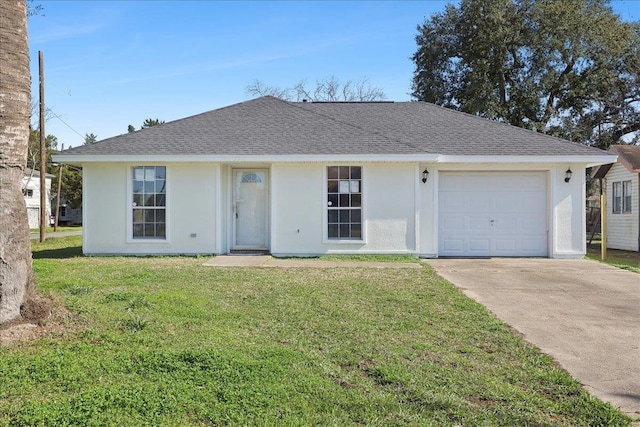 ranch-style home featuring driveway, a shingled roof, an attached garage, a front lawn, and stucco siding