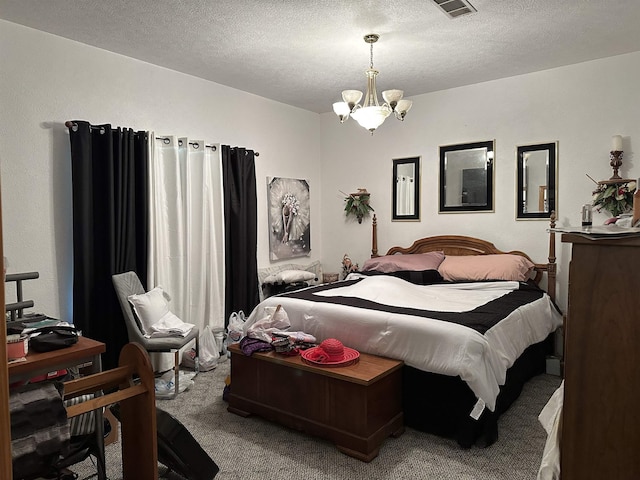 304 County Road 773, Buna, TX 77612 - bedroom featuring carpet floors, a chandelier, and a textured ceiling