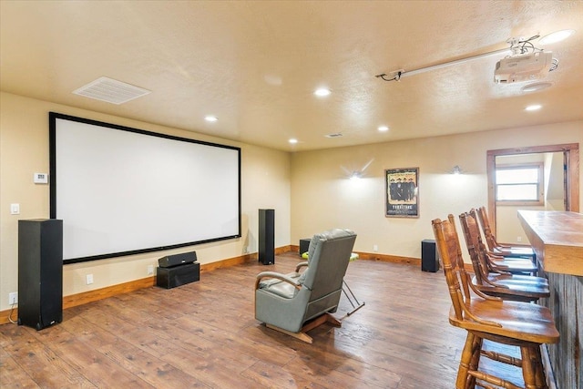 home theater featuring wood-type flooring